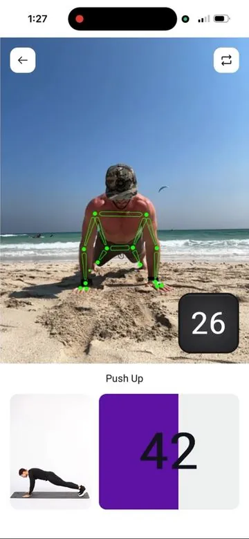 The Core Direction app counting push ups from the phone camera with live form tracking on a beach